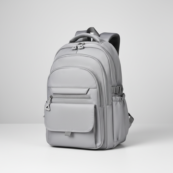 Side profile of unisex multi layer laptop backpack showing water resistant fabric