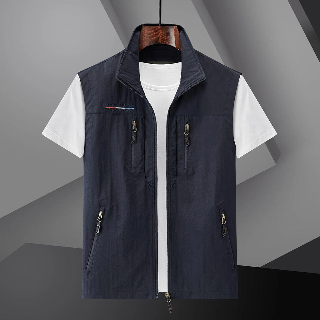Men's dark blue multi-pocket utility summer travel vest