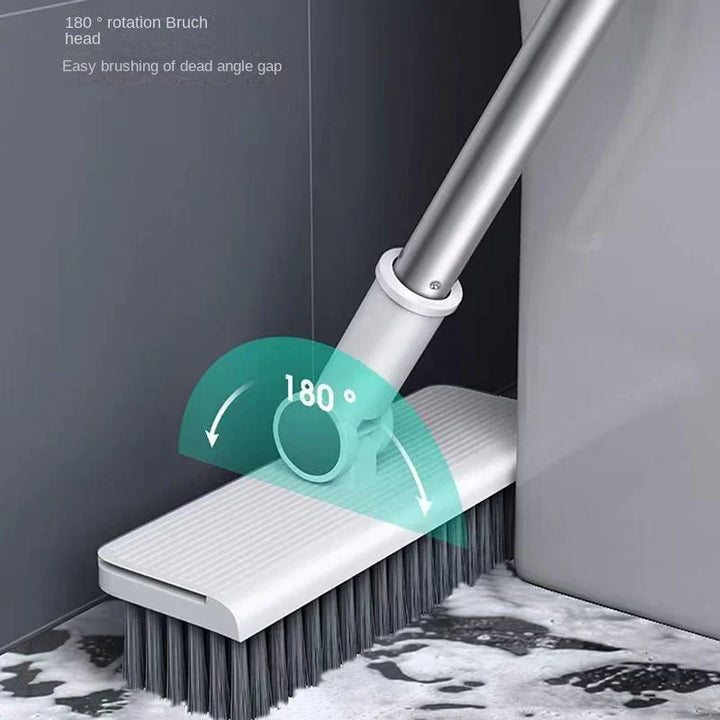 Angle view of the upright dustpan with teeth for cleaning bristles effortlessly