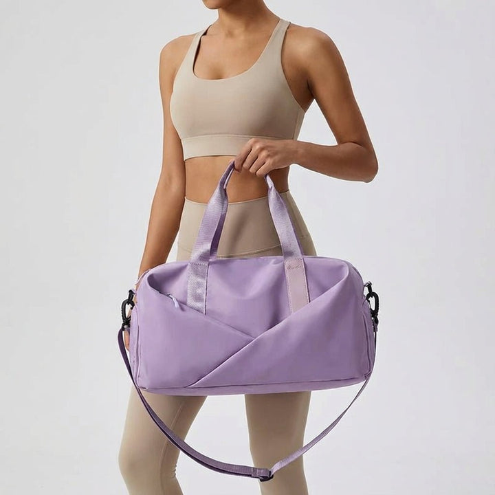 Travel fitness workout shoulder bag showing spacious interior compartment