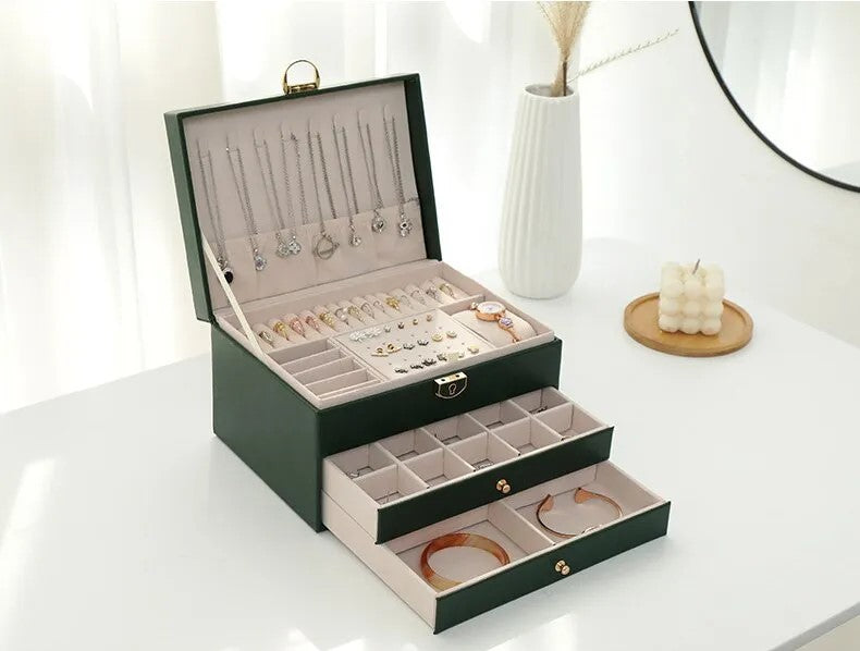 Open storage organizer showing ring rolls and compartments