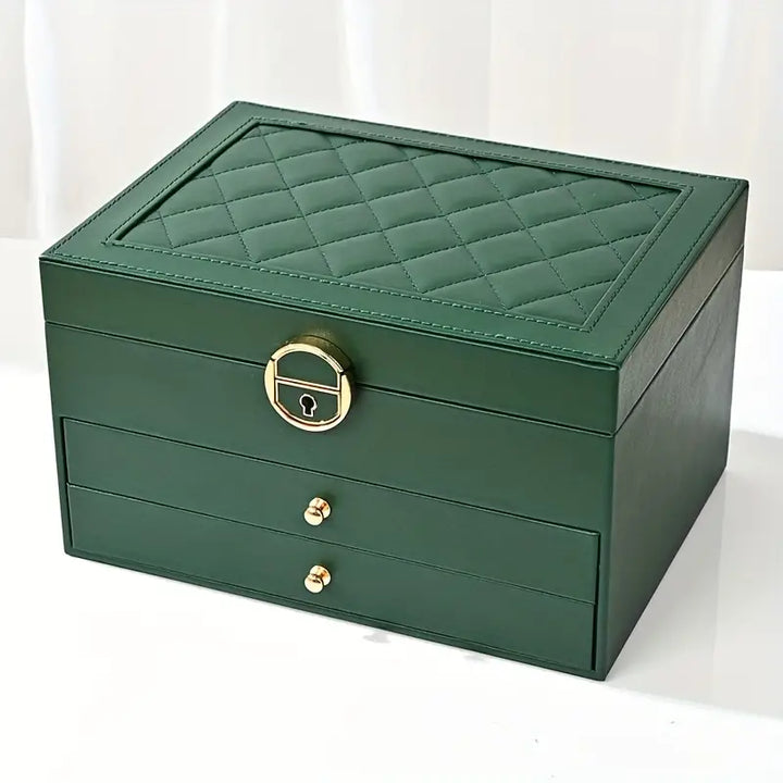 Green multilayer jewellery storage box with gold closure