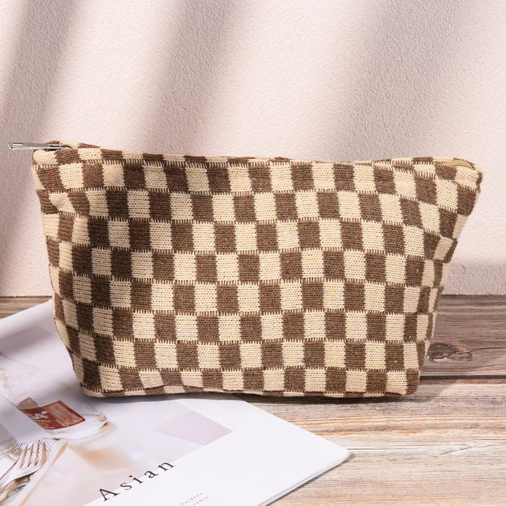 Water-resistant travel organizer and toiletry bag with checks