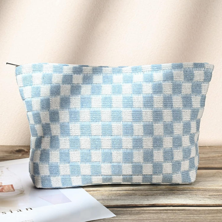 Compact toiletry bag and cosmetic pouch in classic checkered design