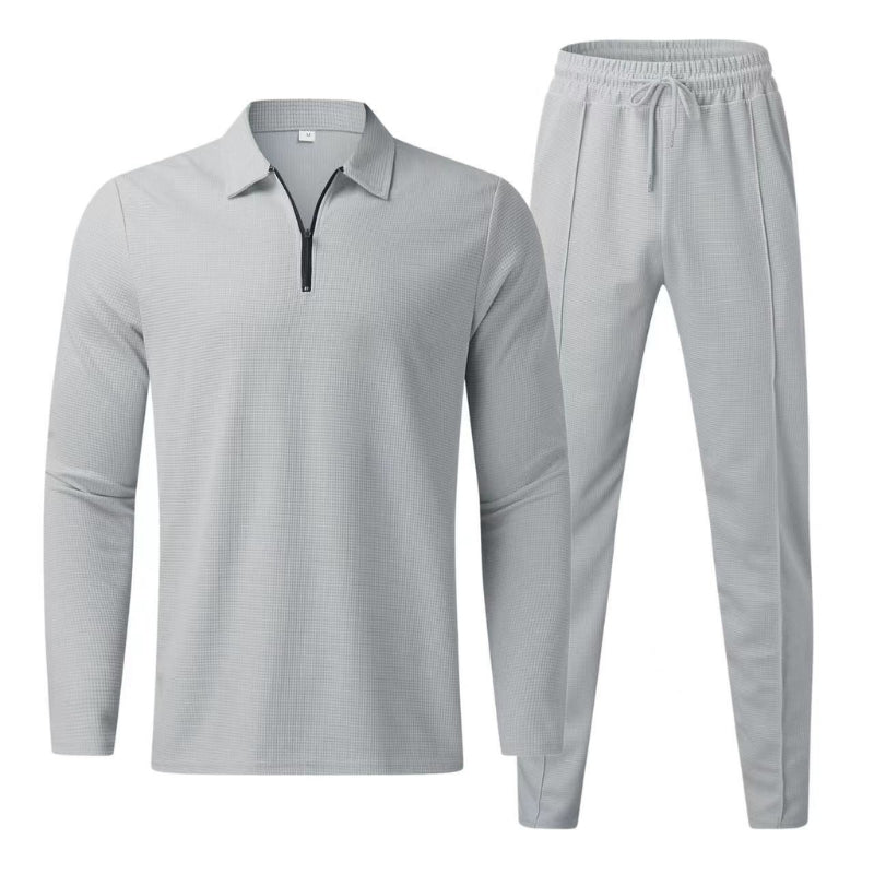 Mens quarter zip polo tracksuit set featuring casual jogger pants and stylish top