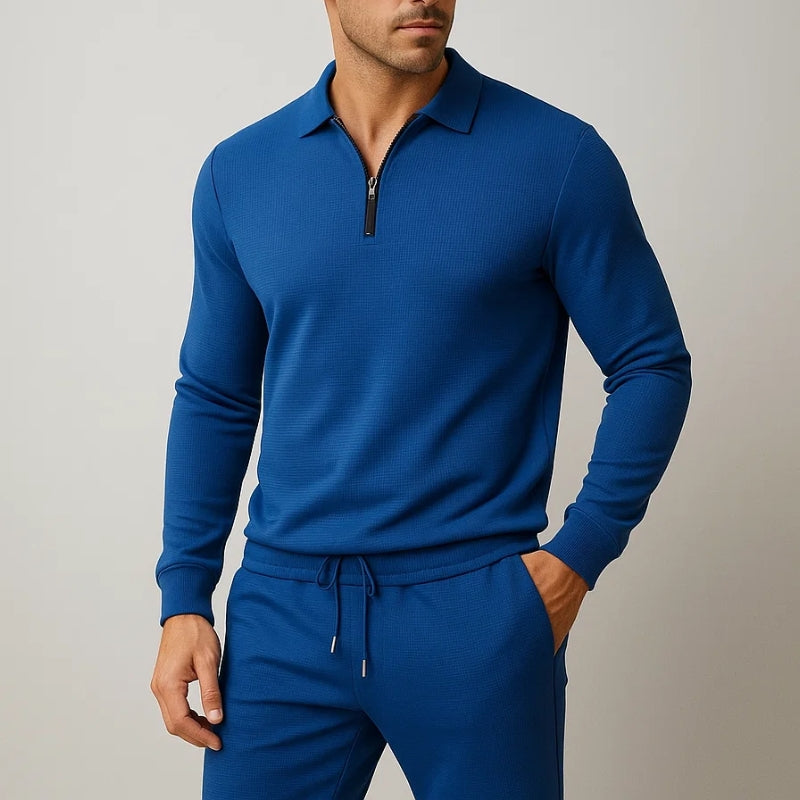 Close up view of the mens quarter zip polo collar and fabric texture in two piece set