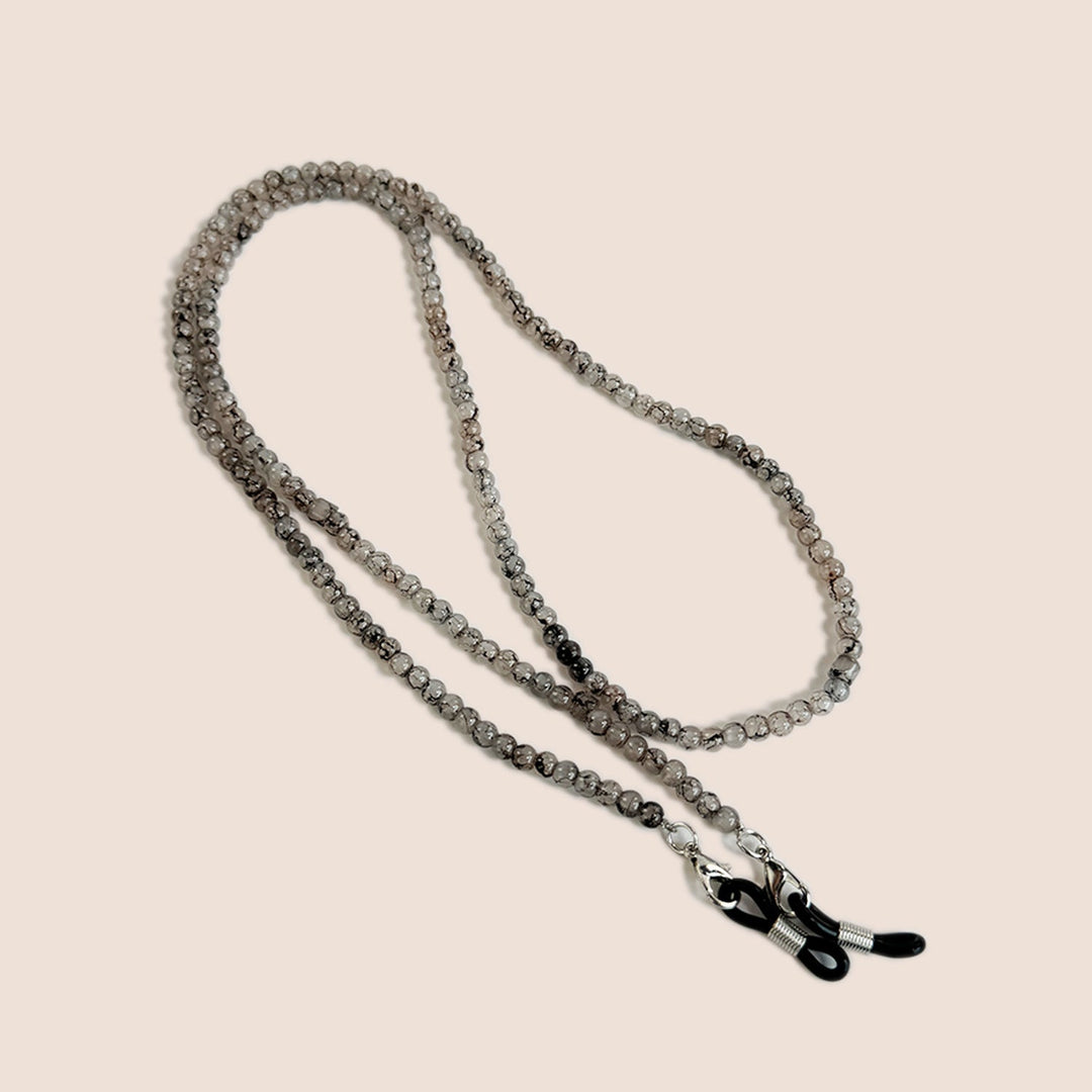 Grey beaded glasses chain displayed neatly