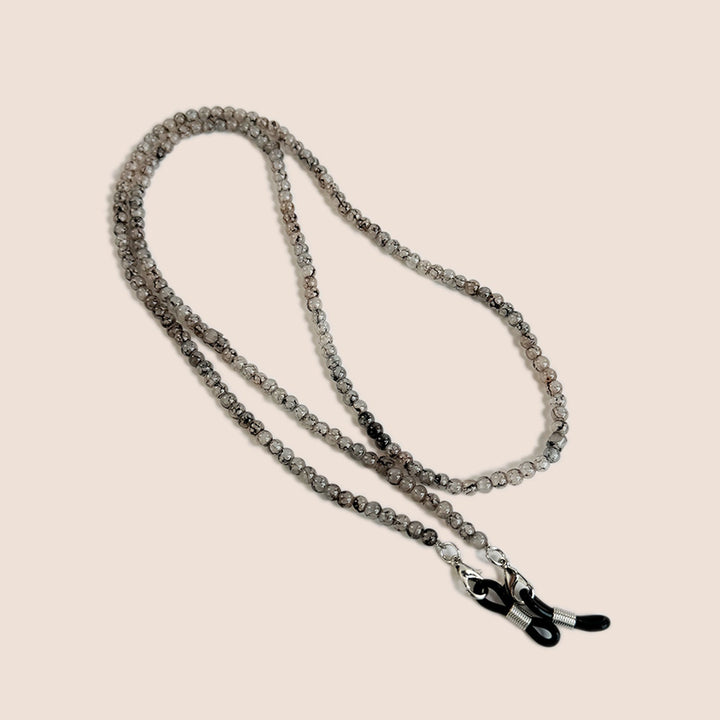 Grey beaded glasses chain displayed neatly