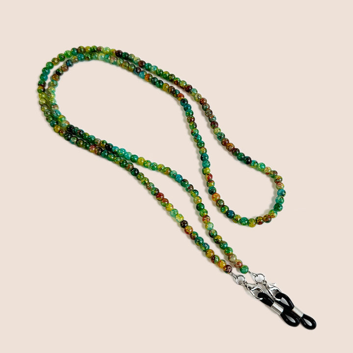 Stylish beaded strap for glasses showcasing detailed craftsmanship and secure metal attachment rings