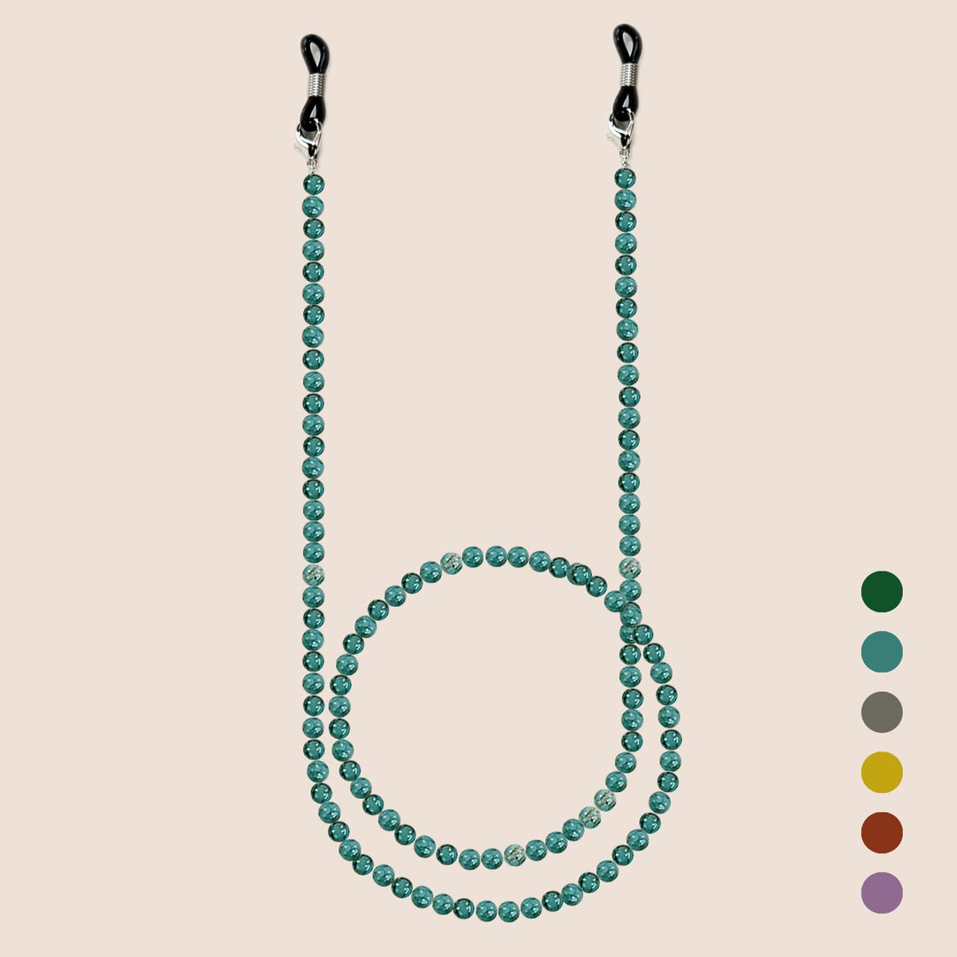 Elegant beaded glasses chain draped gracefully, functioning as both a fashion accessory and holder