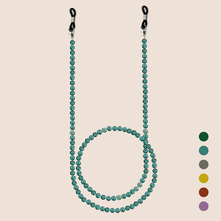 Elegant beaded glasses chain draped gracefully, functioning as both a fashion accessory and holder