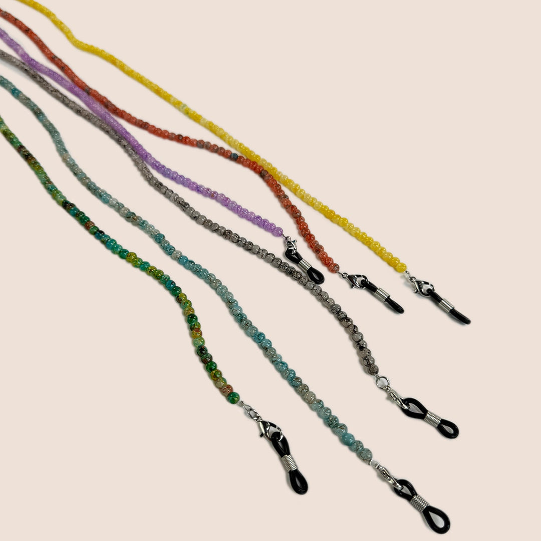Trendy beaded accessories for women, highlighting a colorful glasses chain and strap design