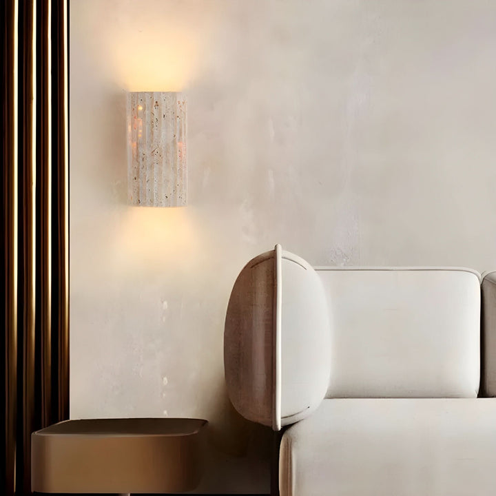 Modern natural stone LED wall sconce showcasing unique mineral texture and warm lighting.