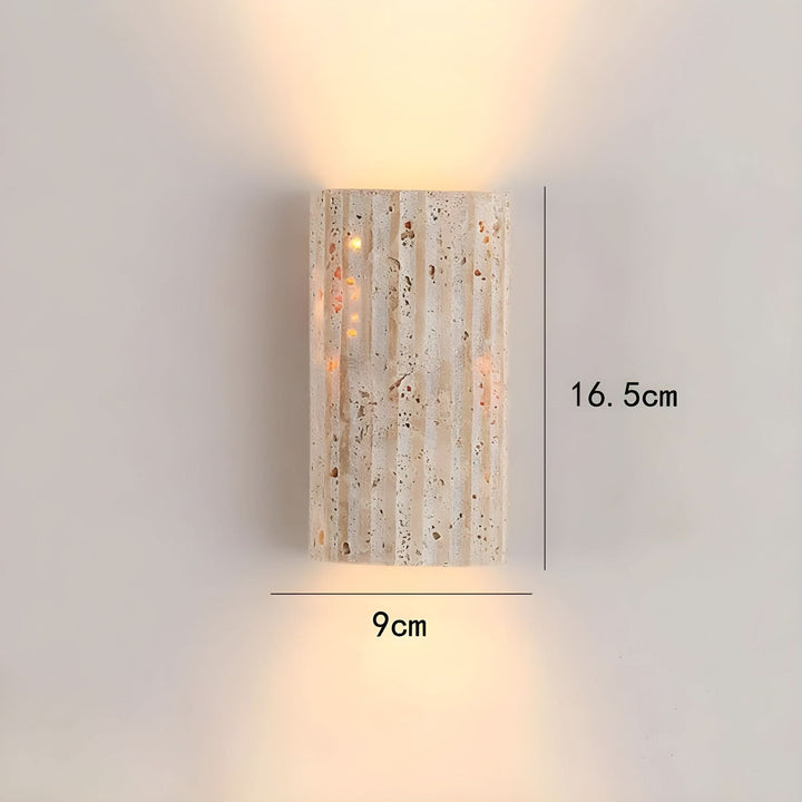 Indoor LED wall lamp crafted from natural stone for elegant bedroom lighting decor.