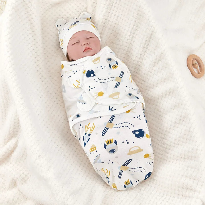Baby swaddle blanket featuring a playful Rocket space pattern with a cute matching cap