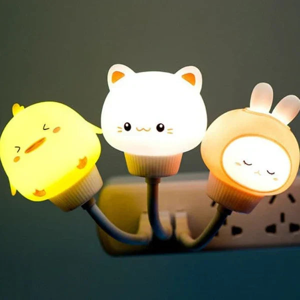 Rechargeable USB animal night light placed on a modern wooden bedside table