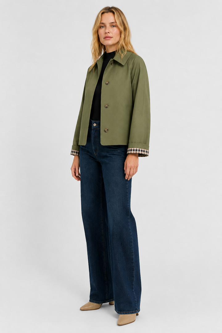 Back view of womens lightweight casual jacket in navy blue