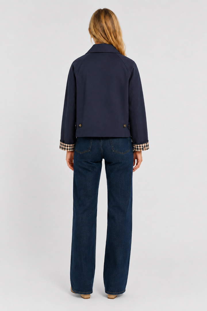 Navy blue transitional jacket layered for cool weather