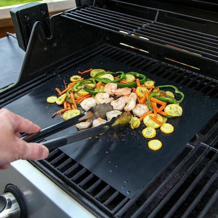 Essential BBQ accessories showing food cooking evenly on a non-stick sheet