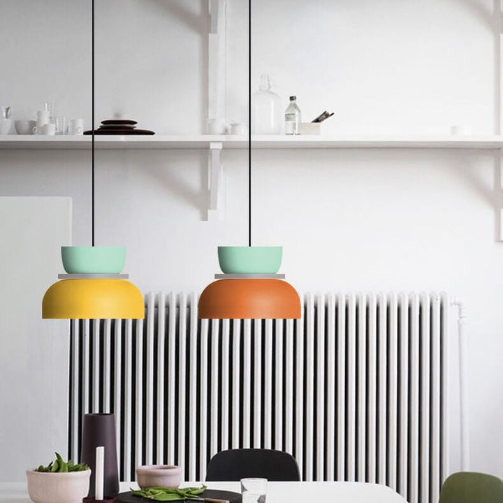 Modern pendant light featuring a vibrant metal lampshade for kitchen
