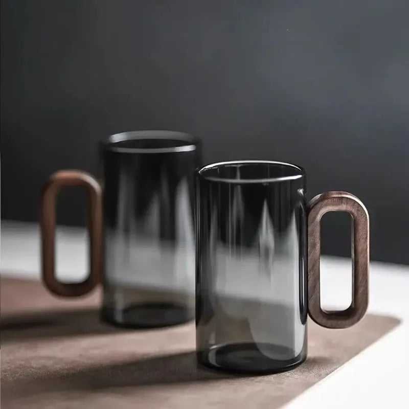 Nordic walnut glass mug with ergonomic wooden handle for hot coffee and tea