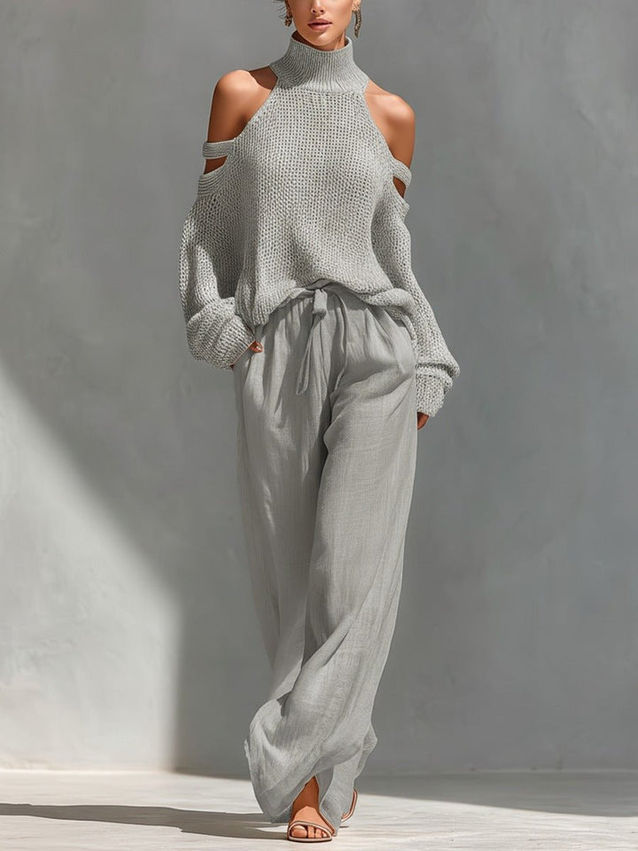 Woman wearing gray off-shoulder two-piece set with wide-leg trousers