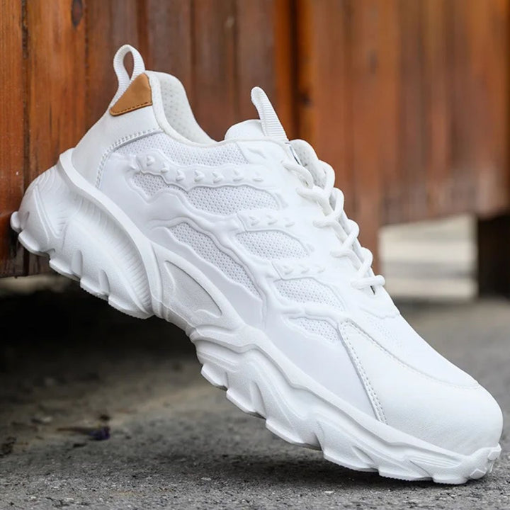 Mens safety shoes with steel toe cap showing side profile and grip sole
