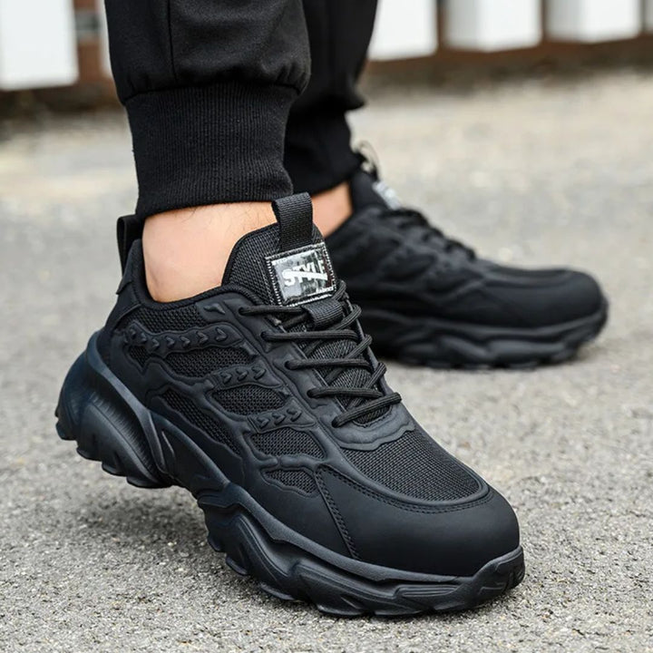 Protective work footwear displaying breathable mesh upper and durability