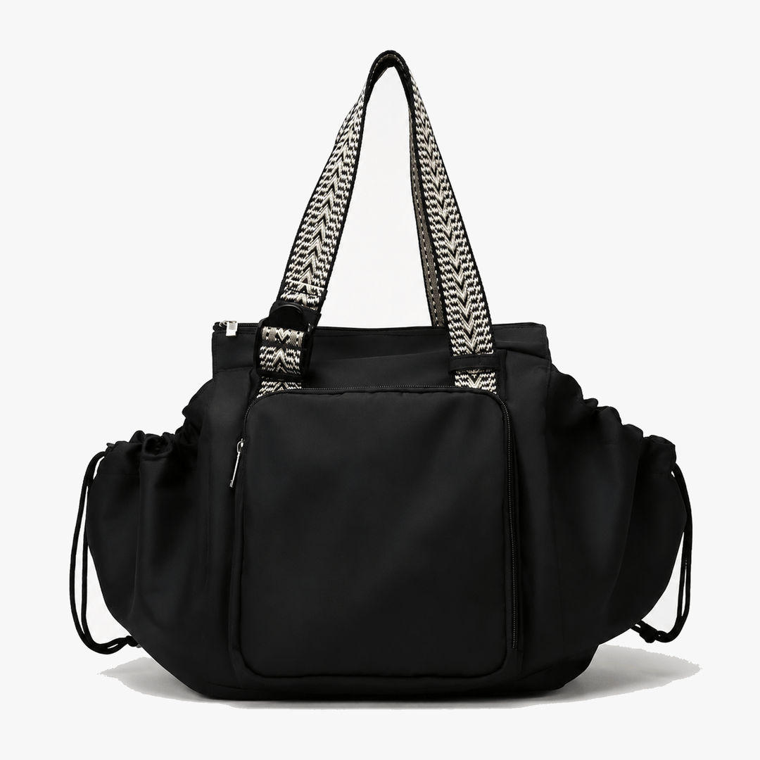 Black convertible everyday tote and backpack with patterned straps