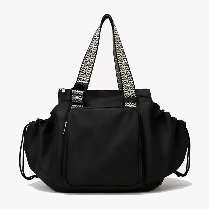 Black convertible everyday tote and backpack with patterned straps