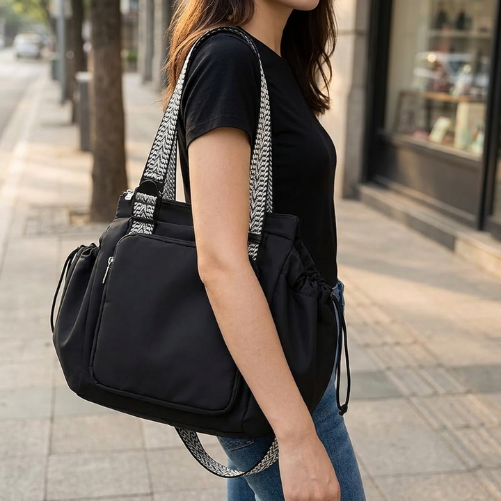 Womens convertible bag displaying spacious interior and organizational pockets