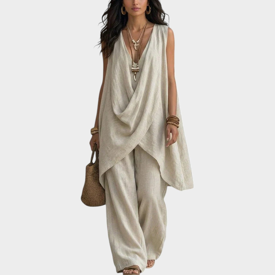 Woman wearing a beige bohemian sleeveless top and wide leg pants matching set