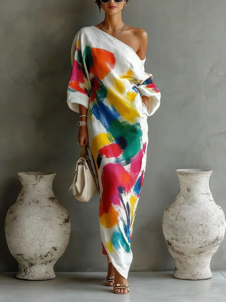 Full shot of model posing elegantly in the colorful abstract maxi dress