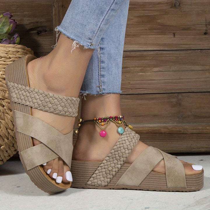 Side view of women's casual platform sandals with orthopedic support and woven strap
