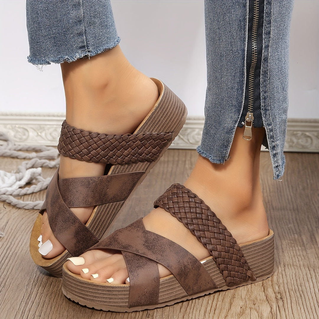 Model wearing women's stylish orthopaedic woven platform sandals outdoors