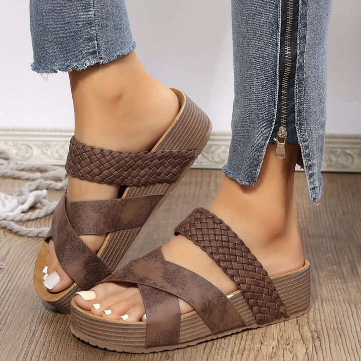 Model wearing women's stylish orthopaedic woven platform sandals outdoors