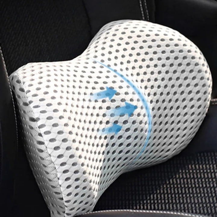 Side profile of an orthopedic back support pillow showing its ergonomic curve for posture