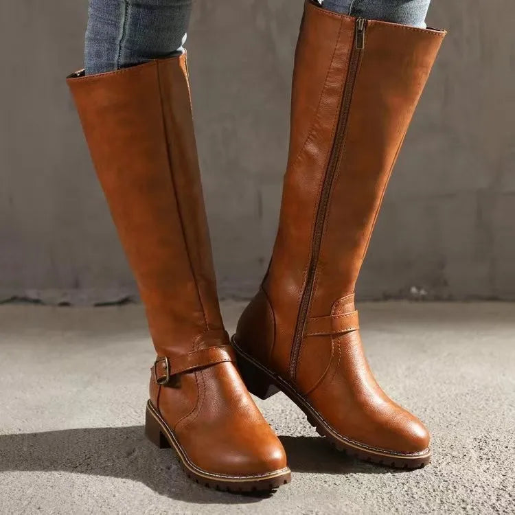 Women wearing light brown orthopedic buckle knee-high boots