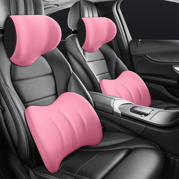 Travel comfort orthopedic pillow installed on a vehicle driver seat