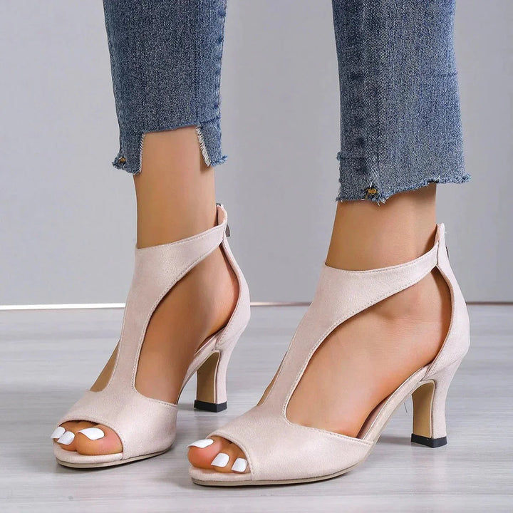 Side profile of comfortable women's orthopedic t-strap block heels with arch support