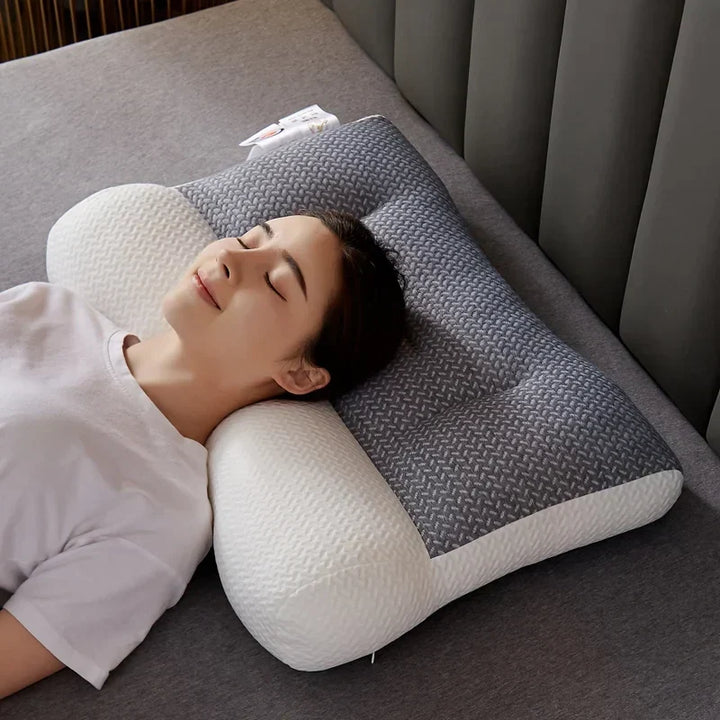 Woman sleeping comfortably on the ergonomic orthopedic neck pillow