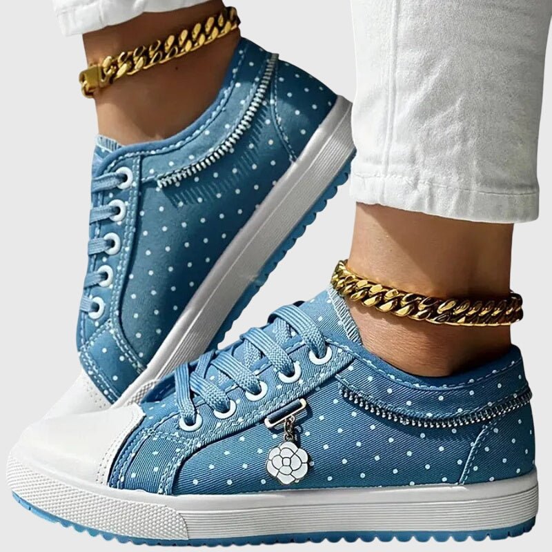 Pair of women's orthopedic sneakers with wide toe box and flexible design