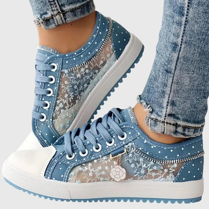 Women's blue orthopedic walking sneakers with lace-up design and decorative charm