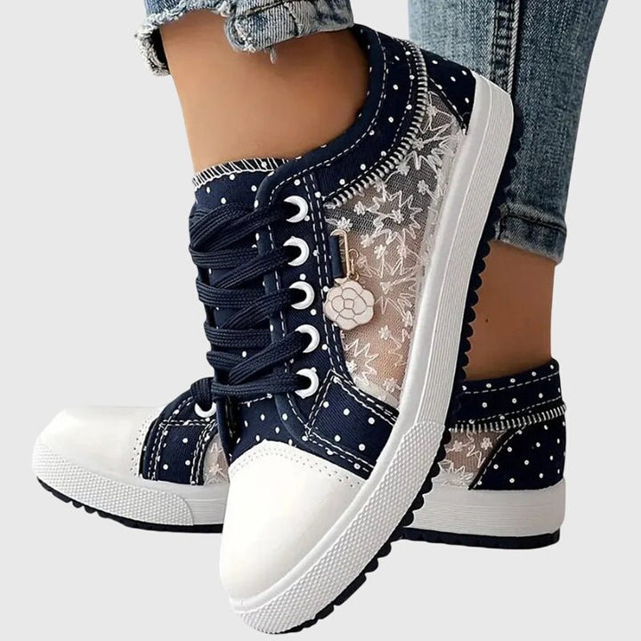 Close-up of cushioned insoles inside women's orthopedic walking sneakers