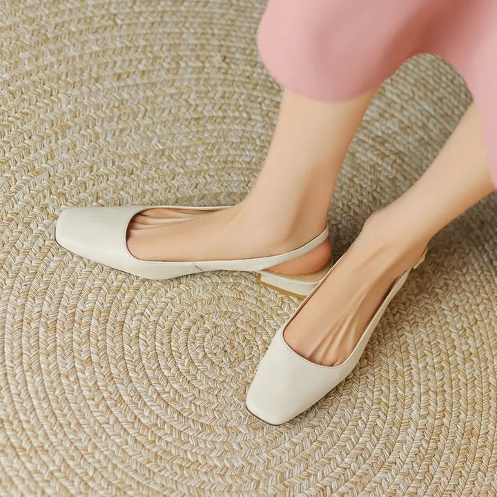 Side angle of beige women orthopaedic slingback loafers with arch support