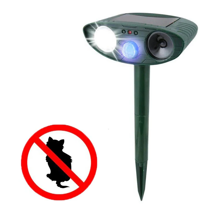 Green solar animal repeller with no-cat warning sign graphic
