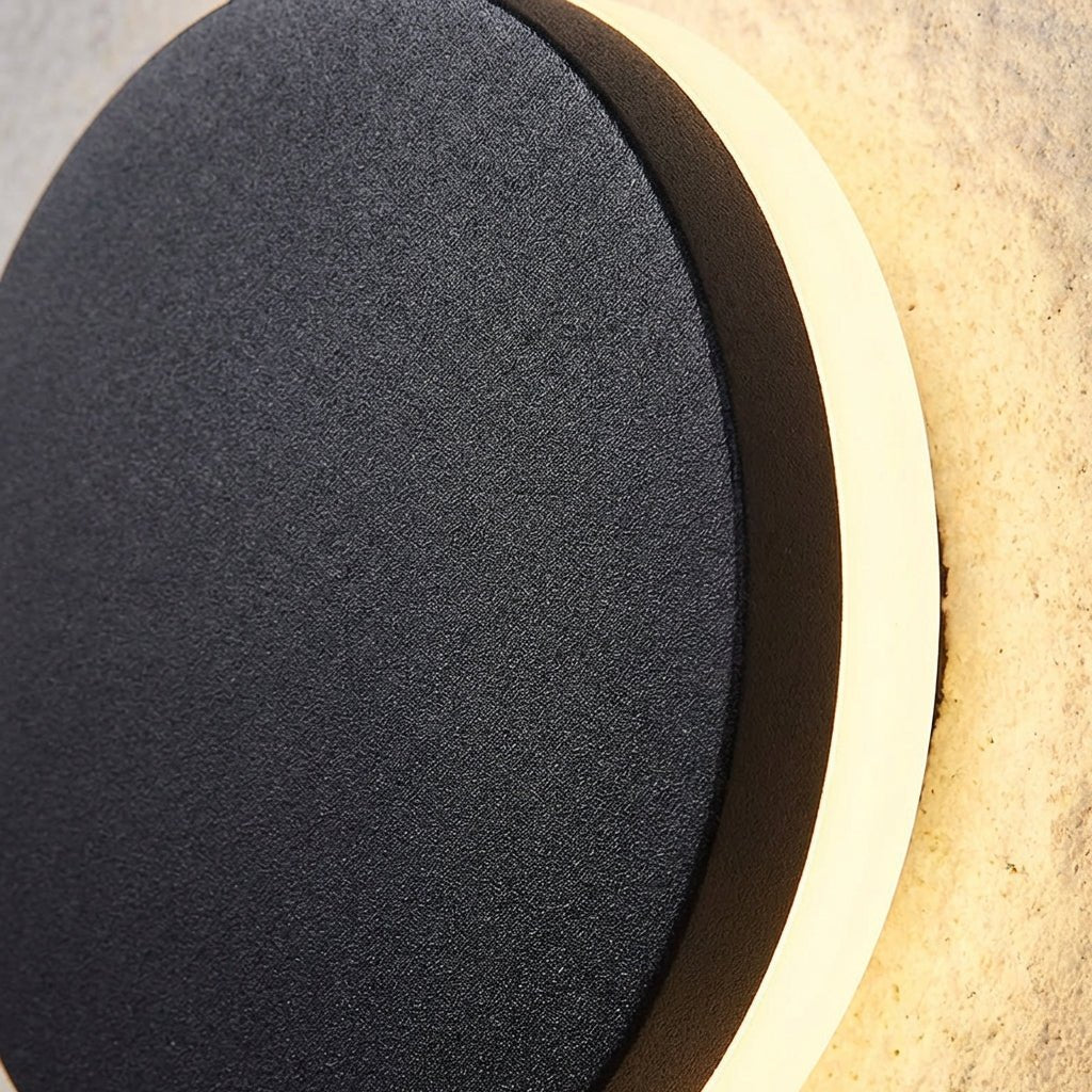Modern outdoor wall lamp featuring minimalist design and bright LED up and down lighting.
