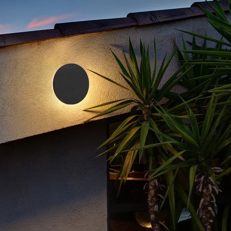 Weatherproof exterior light with sleek black finish for stylish patio lighting.