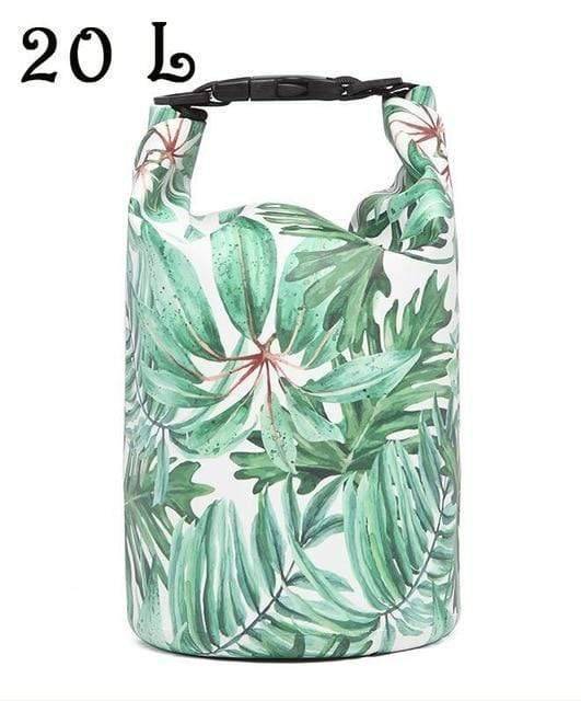 Beach day essentials packed neatly inside a sandy waterproof dry bag