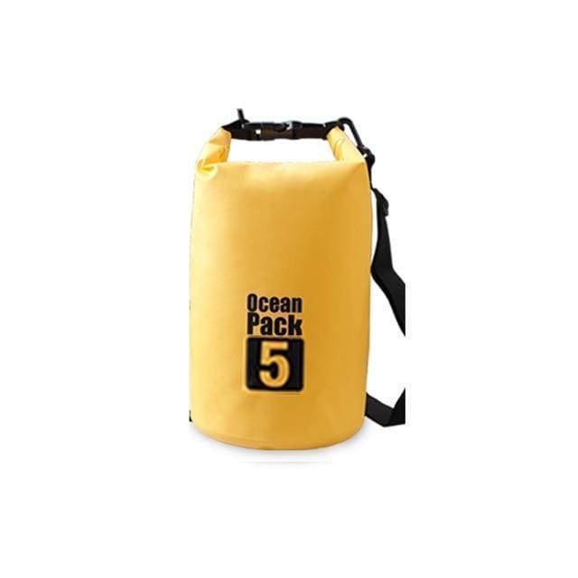 Yellow waterproof dry bag designed for camping and water sports